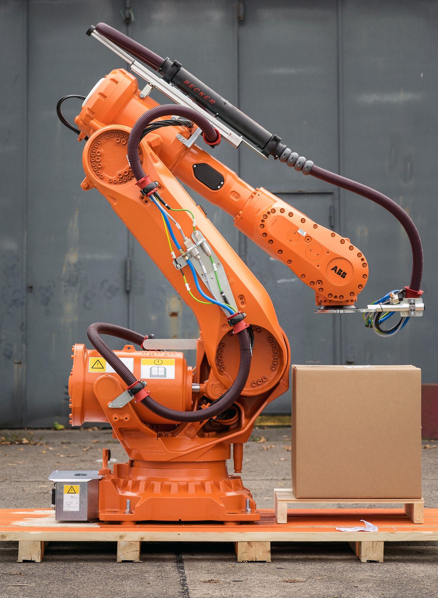Dressed KUKA robot palletized for delivery