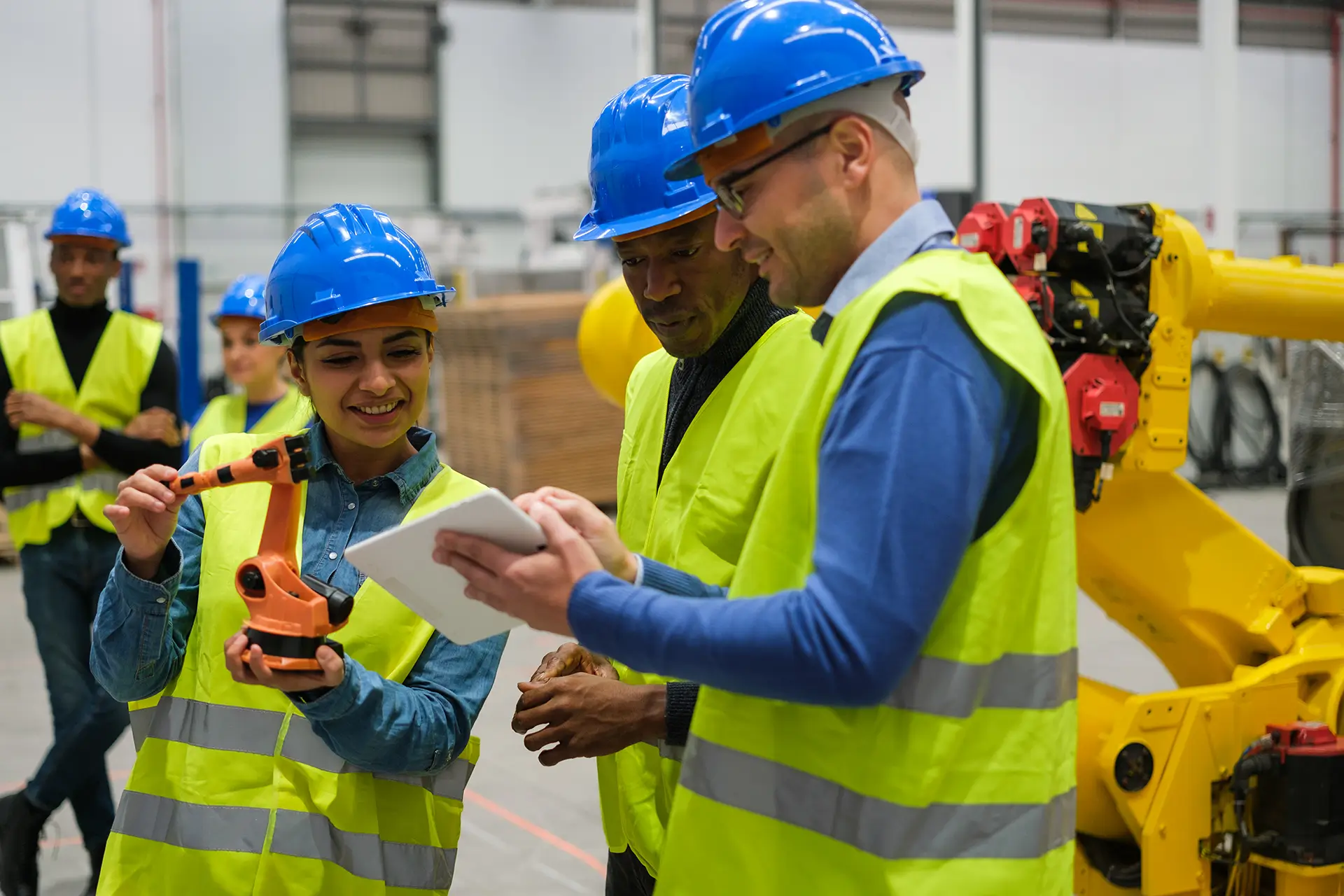 Becker engineers reviewing a project on the factory floor