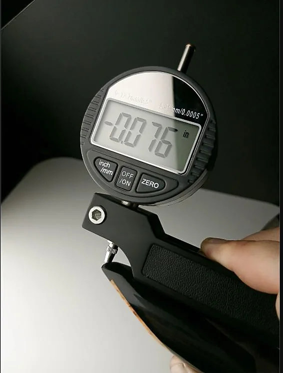 Dial thickness gauge during quality inspection